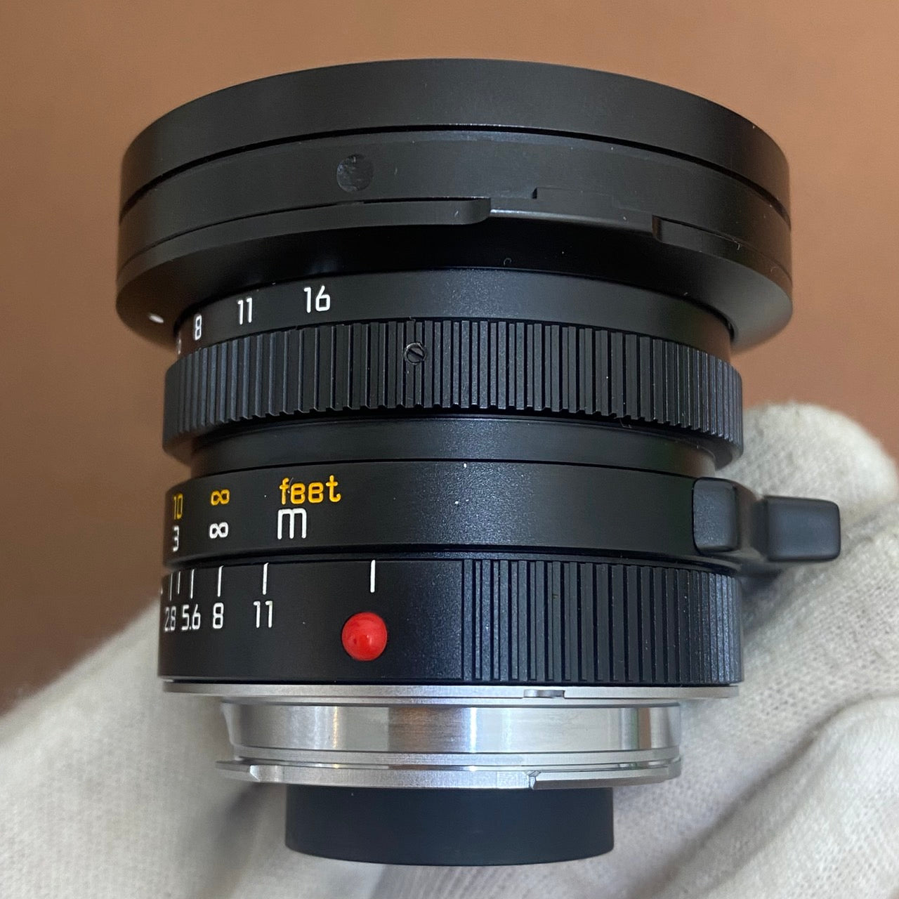 Elmarit M21mm f2.8 1st 後期 1985年製 箱＆フード付き LEICA Elmarit M21mm f2.8 1st 後期 1991年製 OH済み – まるかめら
